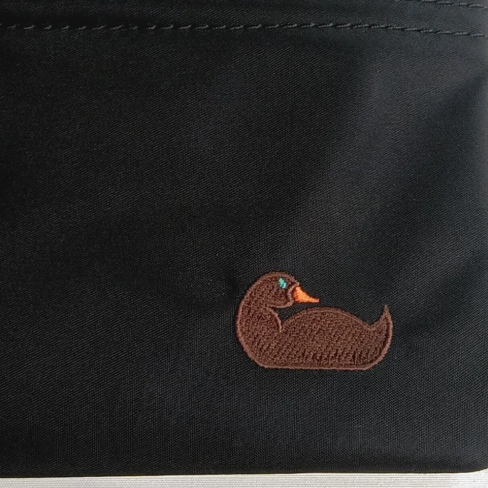 Dooney & Bourke Black and Olive Green Wristlet Clutch